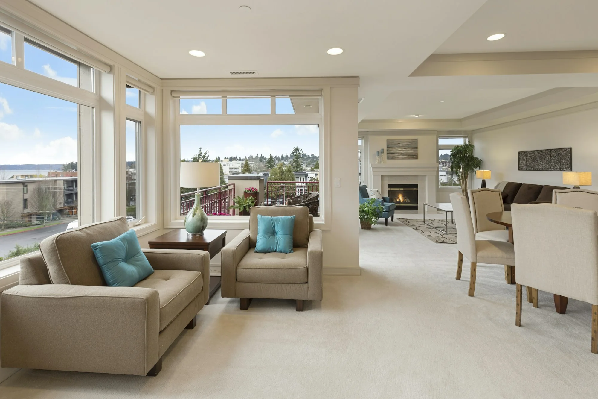 Light-filled living space with soft furnishings and a carefully maintained carpet